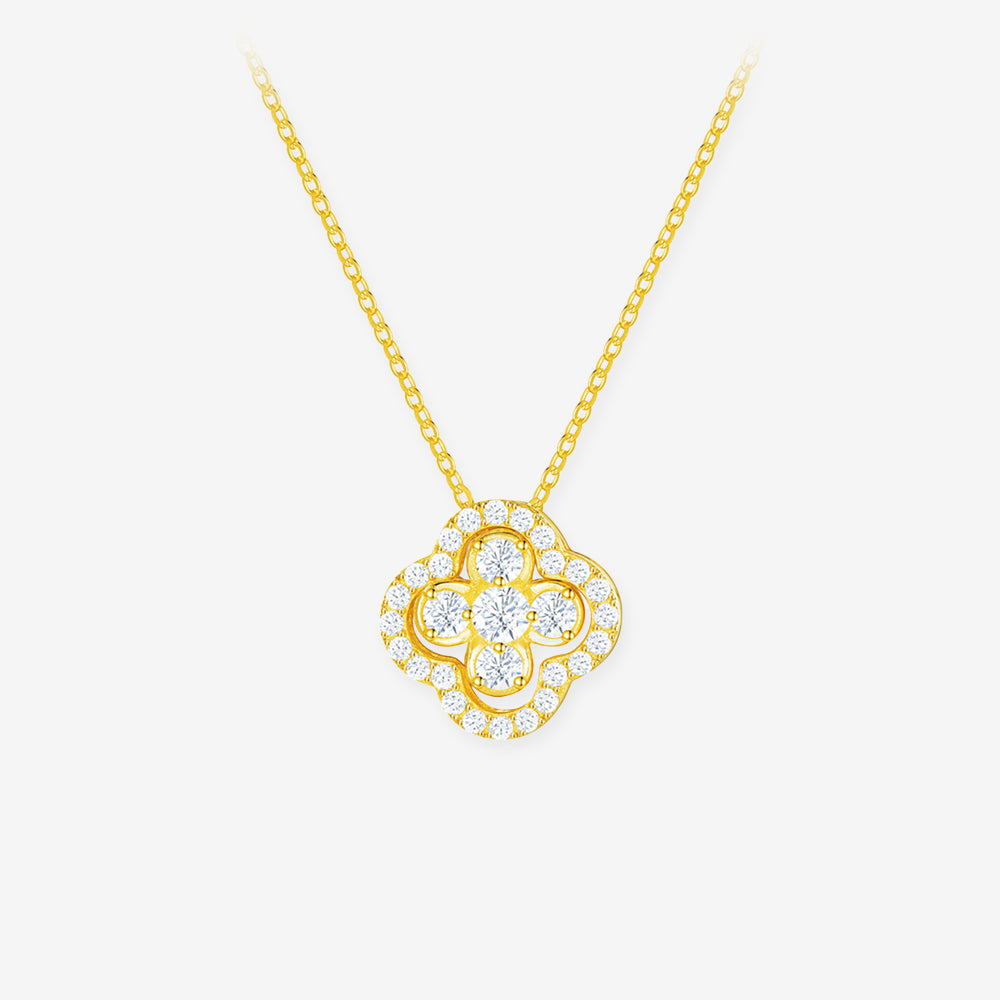 Gold-tone clover necklace with five round cubic zirconia, a scalloped halo and a simple link chain