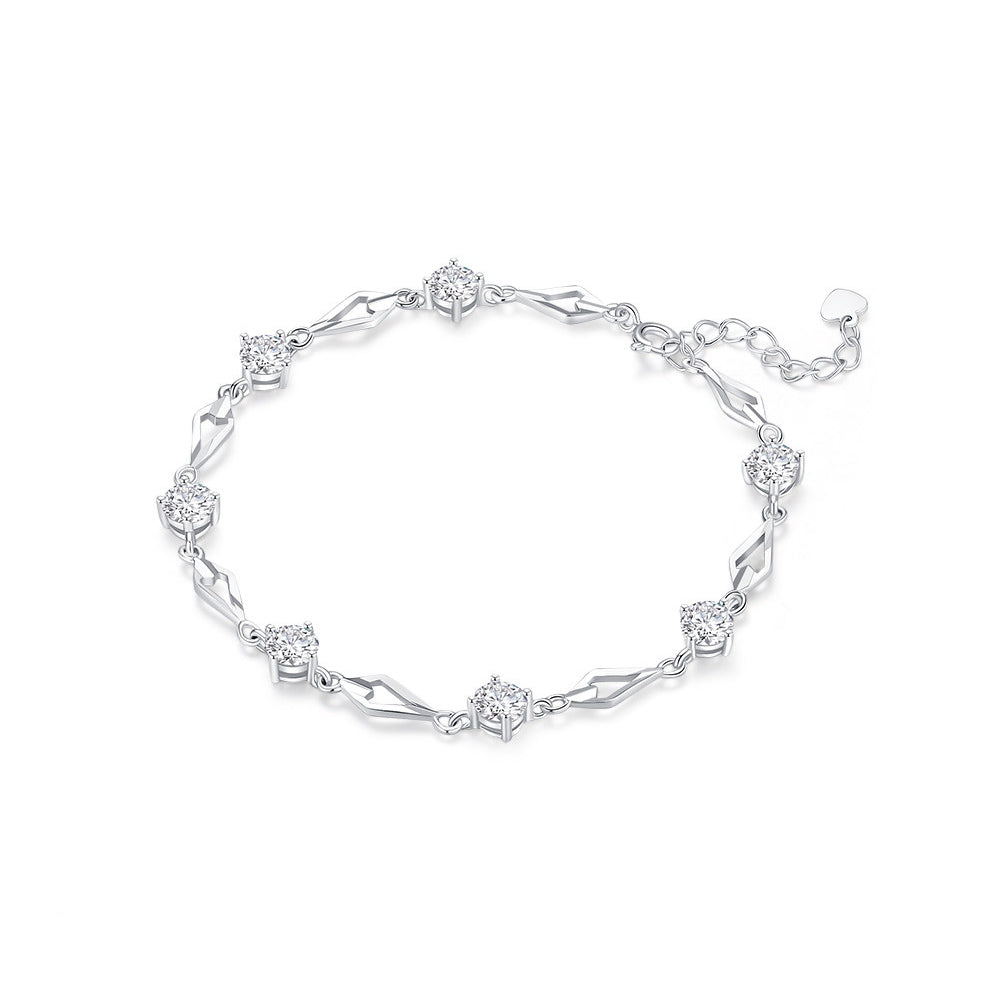 Close-up of rhombus heart charm with sparkling cubic zirconia on 925 sterling silver bracelet – ChowTaiSeng