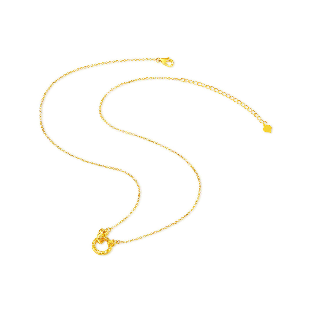 Gold-plated silver double-ring necklace laid flat, showing the lobster clasp, extender and logo tag
