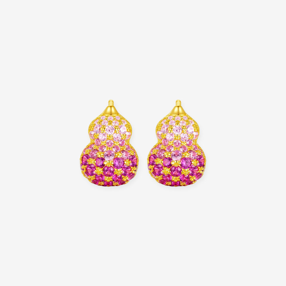 Pair of gold-plated silver gourd stud earrings with graduated pink synthetic ruby and cubic zirconia on white