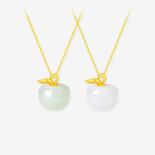 ChowTaiSeng Hetian jade apple necklace in white and green jade variants, gold plated sterling silver leaf bail on gold cable chain, white background