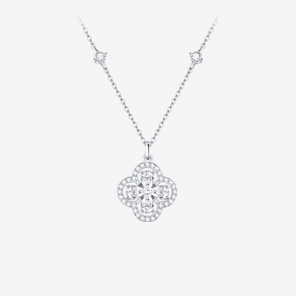 Silver-color clover necklace with four pear-cut cubic zirconia, a sparkling halo and a station chain