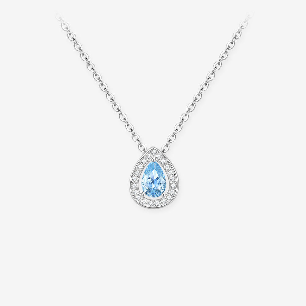 ChowTaiSeng Blue Moon Sea 925 sterling silver necklace on white background, featuring sky-blue teardrop cubic zirconia halo pendant on delicate chain