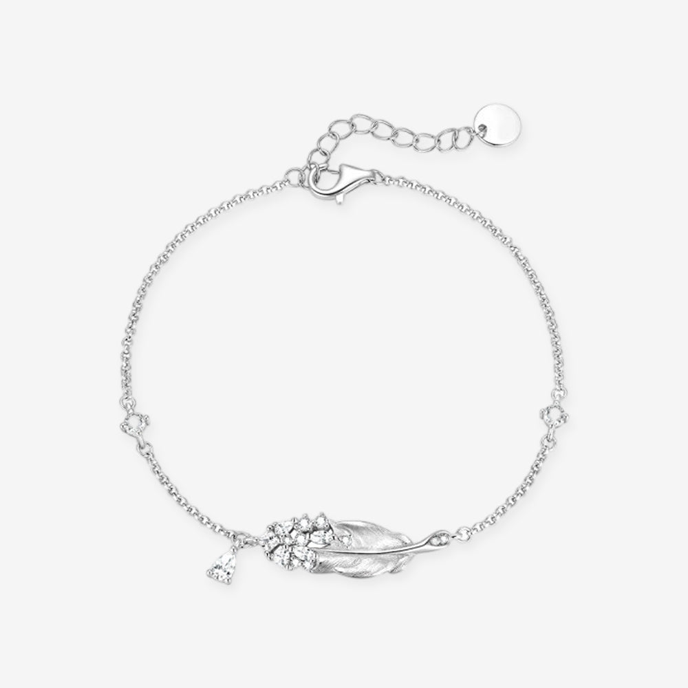 925 sterling silver vintage swan feather chain bracelet with cubic zirconia cluster and teardrop charm, product flat lay on white background