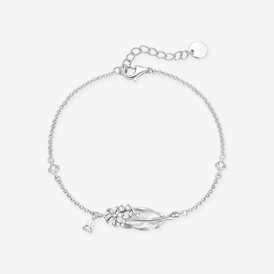 925 sterling silver vintage swan feather chain bracelet with cubic zirconia cluster and teardrop charm, product flat lay on white background