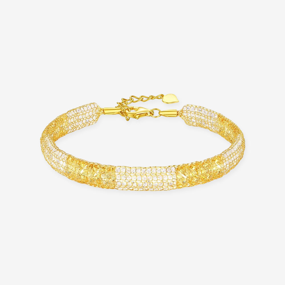 Gold-plated sterling silver two-tone mesh bracelet with cubic zirconia, clasp and extender on white background