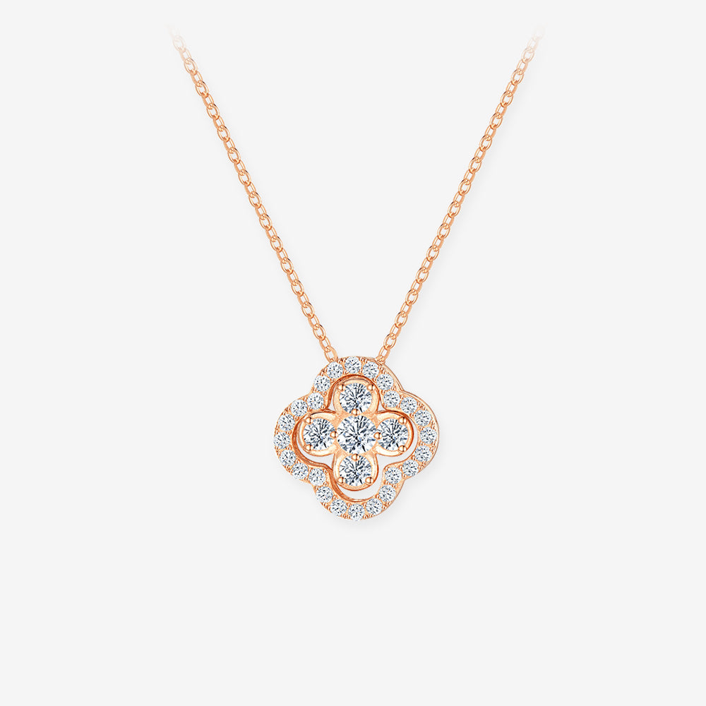 Rose-gold-tone clover necklace with five round cubic zirconia, a scalloped halo and a simple link chain